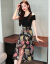 何媛のワンピスの女性ギルコゼミ2019夏の半袖の新制品の韩国版は腰が见せやせの中に长いスタルが流行しています。A字の半身のスカウトの白黒の大きな花Mは85-105斤の服を着ていると提案しています。
