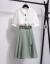 甘い怡阁のスーパーズのワンピ夏の韩国版の气质の女神の范の服の軽さに熟している风格のチョウゼルのショーツの上半身のスカウトの2つのセトのフュートのファック